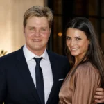 Carly Matros biography article image showing a smiling couple at a formal evening event.