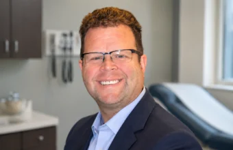 Dr. Frank Scafuri Staten Island professional medical headshot in a clinic office