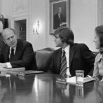 Gerald Ford speaks with Michael Ford and Gayle Ford in the White House Cabinet Room in 1975