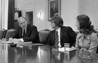 Gerald Ford speaks with Michael Ford and Gayle Ford in the White House Cabinet Room in 1975