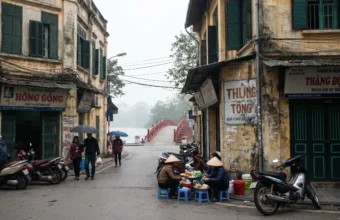 Hanoi Old Quarter street with food vendors near The Huc Bridge and Hoan Kiem Lake