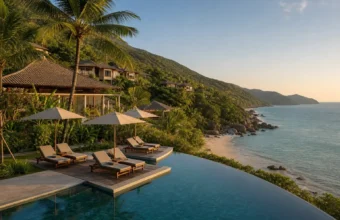 A luxury Vietnam beach resort with infinity pool, hillside villas, palm trees, and sweeping ocean views.