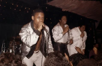Master Gee performing live with The Sugarhill Gang during an early hip-hop concert