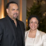 Toussaint L. Jones with S. Epatha Merkerson at a formal event.