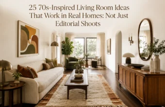 70s-inspired living room with cream sofa, shag rug, wood furniture, plants, and warm vintage accents.