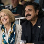 Ann Carlson Khan and Shahid Khan smiling together at a Jacksonville Jaguars game.