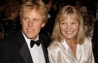 Gary Busey and Judy Helkenberg smiling together at a formal gala dinner in Los Angeles, circa 1985.