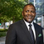 Godwin Ogbebor Houston Texas professional portrait in a dark suit outdoors