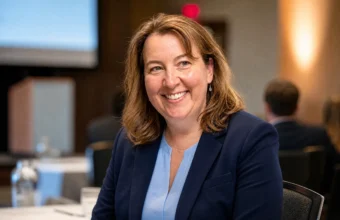 Maureen Fulton of Omaha smiling at a professional conference on Nebraska data privacy law.