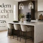 Modern kitchen island with waterfall marble countertop, wood cabinets, pendant lights and bar stools