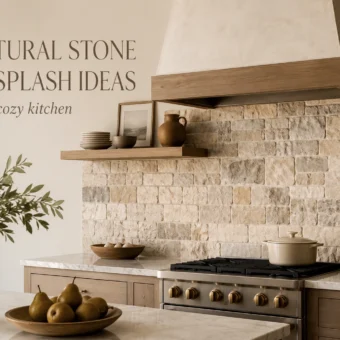 Cozy kitchen with natural stone backsplash, wood shelves, marble counters, and warm neutral styling.