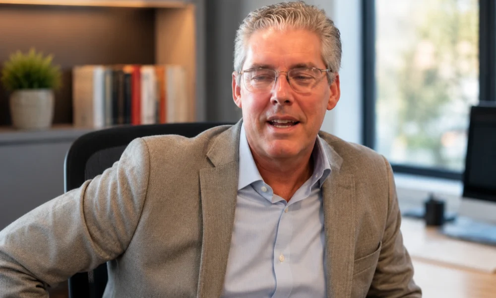 Steven Cauble seated in a professional office setting for a biography about his life beyond divorce.
