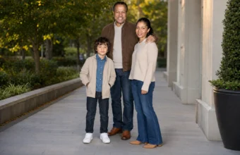 Teruko Nakagami with Billy Dee Williams and family in an outdoor portrait.