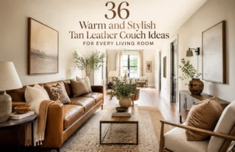 Narrow living room with tan leather couch, neutral pillows, layered rugs, wood table, and warm natural light.