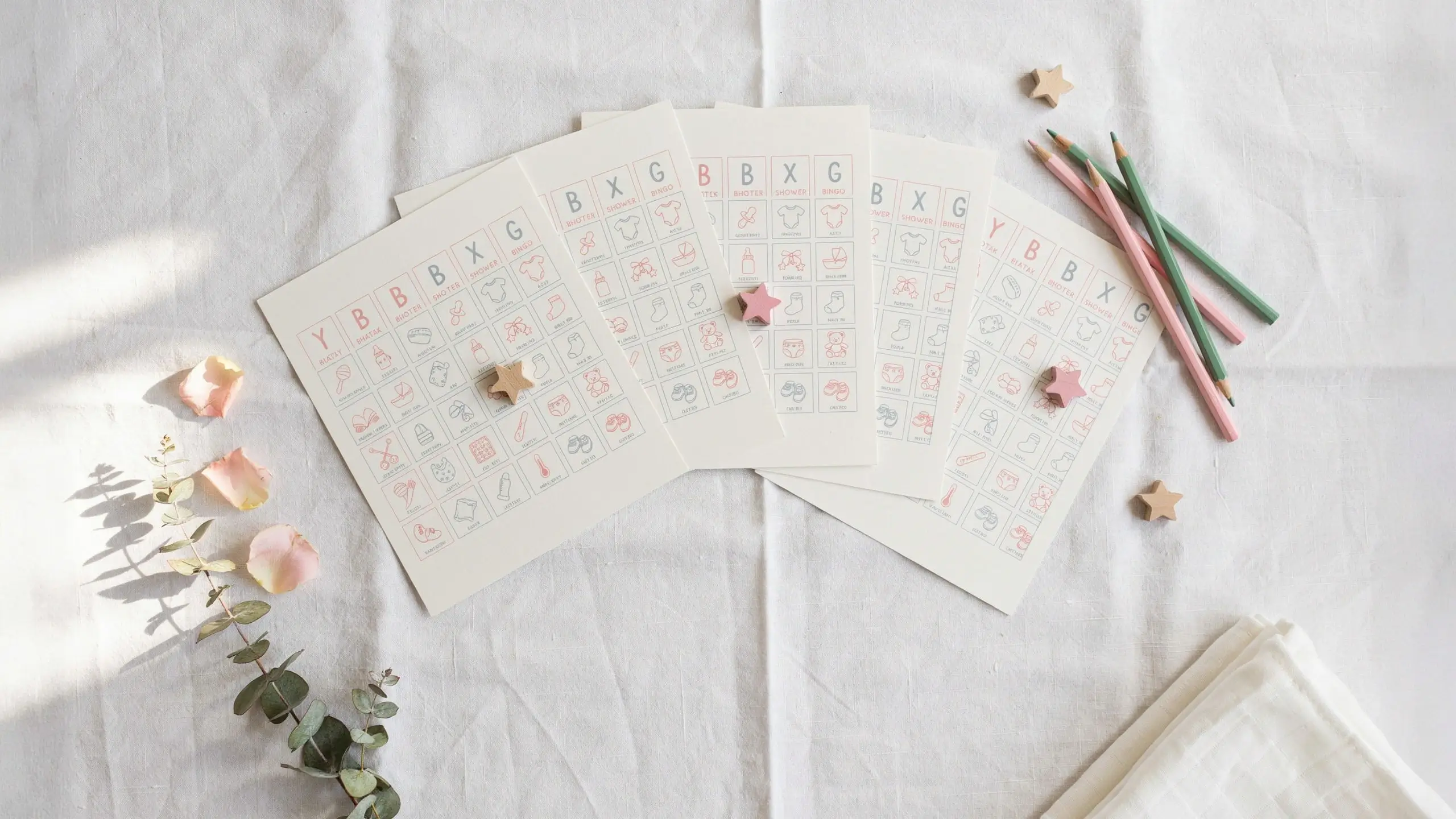 Printable baby shower bingo card with five columns and free space for party games.