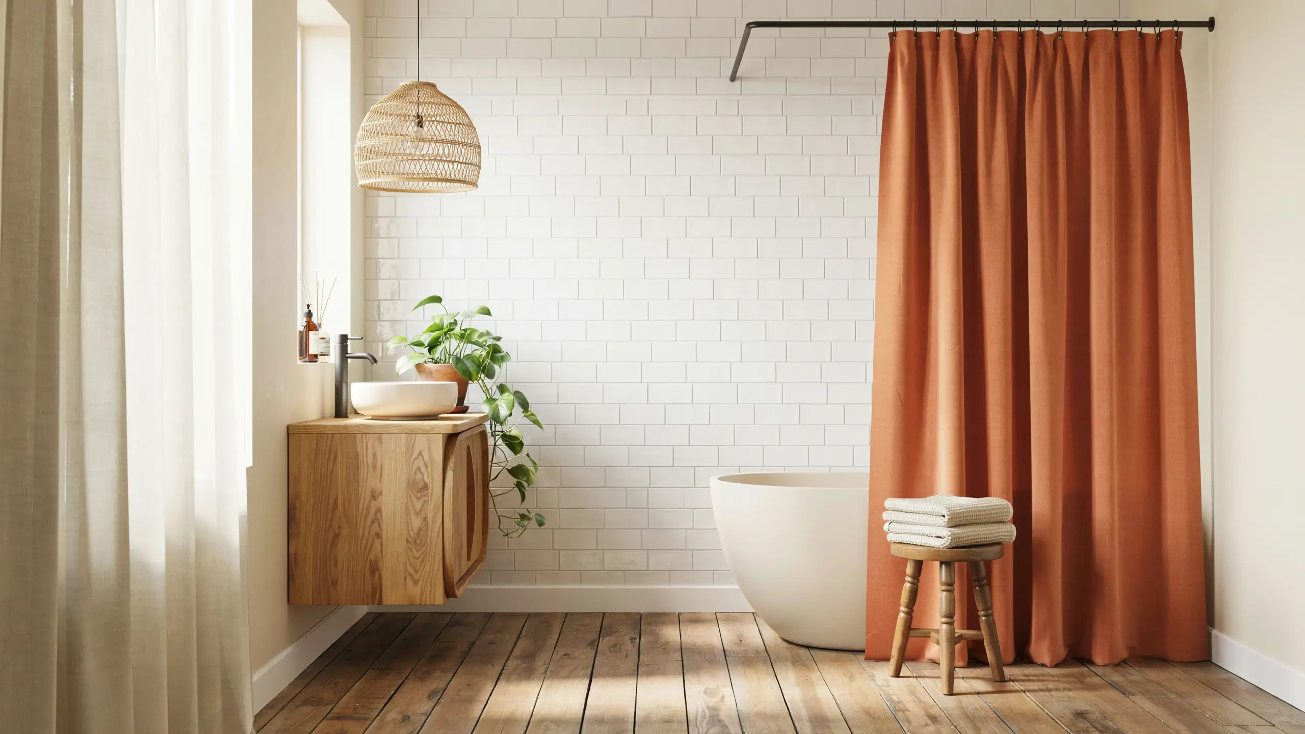 Modern spa-style bathroom featuring white subway tile walls, a light oak floating vanity with a white vessel sink, a woven wicker pendant light, and a bold rust-terracotta shower curtain providing the primary pop of color