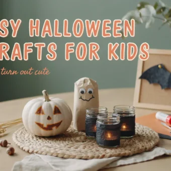 A white pumpkin lantern, brown paper bag ghost, glass candle jars, and a framed paper bat decoration on a wooden table, representing easy Halloween DIY crafts for kids.