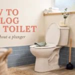 Clean white toilet with open lid and a black rubber plunger in a modern bathroom, illustrating a guide on how to unclog any toilet with or without a plunger