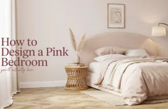 Modern blush pink bedroom design featuring a curved boucle headboard, beige bedding, rattan side table, pampas grass, and an arched floor lamp.