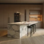 Modern luxury kitchen with marble waterfall island, taupe cabinets, arched window, and black stools
