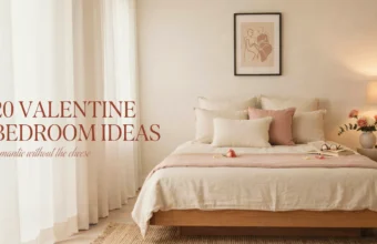 Minimalist and romantic bedroom setup with cream linen bedding, blush pink throw pillows, scattered rose petals, open book, and warm ambient lighting, overlaid with text "20 Valentine Bedroom Ideas romantic without the cheese".