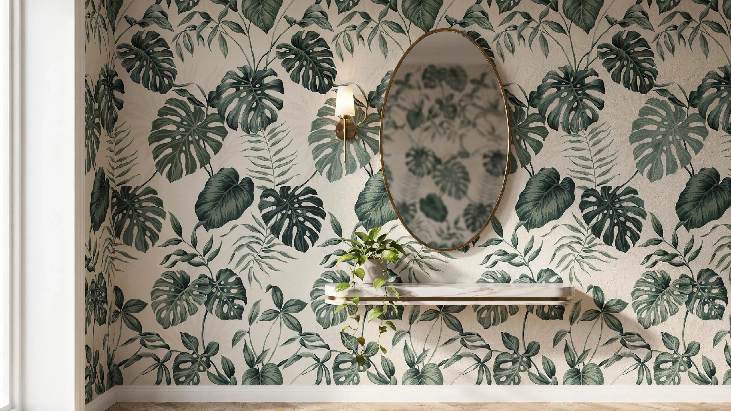 Botanical monstera wallpaper with gold oval mirror and floating shelf on statement wall. 