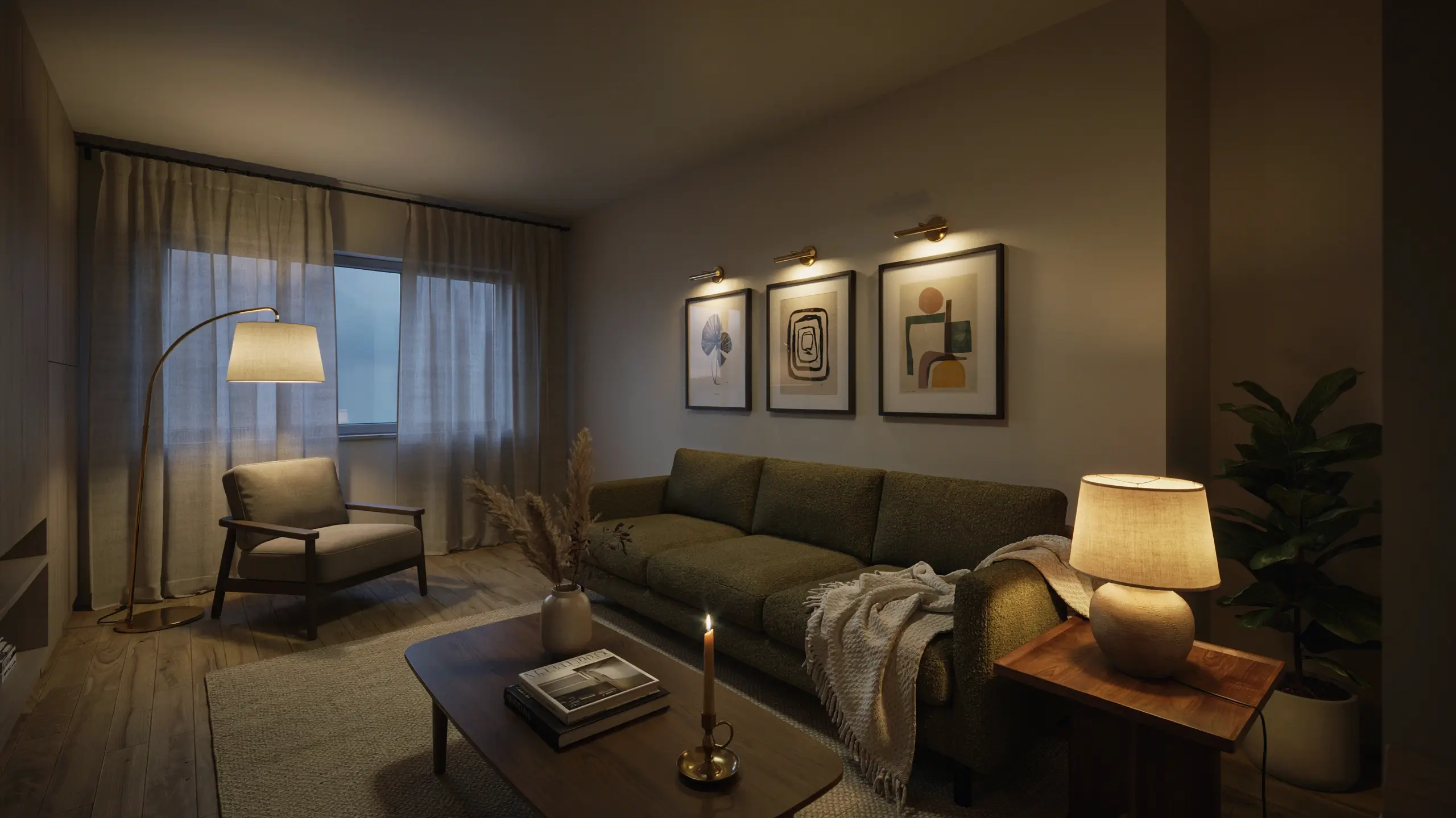 Dimly lit, cozy modern living room showcasing layered lighting techniques: a curved brass floor lamp, a textured stone-base table lamp, and three brass picture lights glowing above abstract framed artworks hung over an olive green chenille sofa.