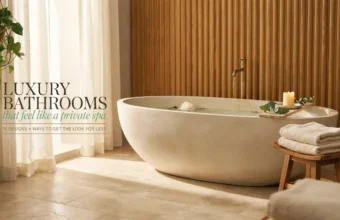 Modern luxury spa bathroom featuring a freestanding stone bathtub with a gold faucet, wooden bath tray with candle and eucalyptus, and vertical wood slat wall paneling.