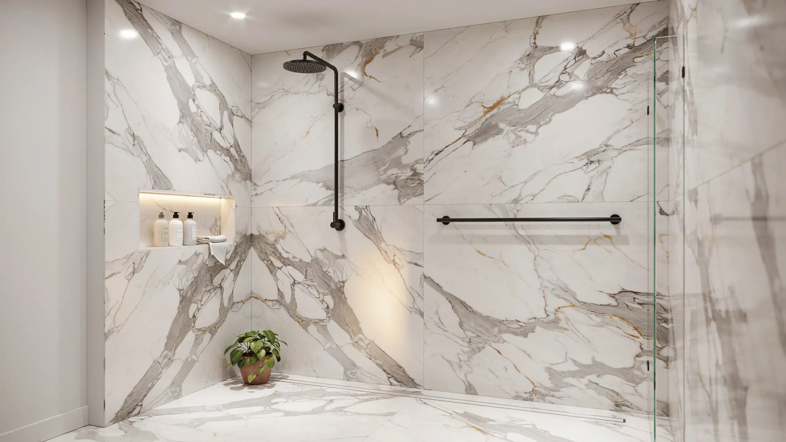 Modern marble-look porcelain walk-in shower with matte black rainfall showerhead, illuminated recessed niche, and glass partition.