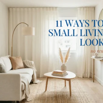 A bright, minimalist small living room featuring a neutral beige sofa, round wooden coffee table, pampas grass, and a floor lamp, with a text overlay offering 11 ways to make a small living room look bigger without renovation.