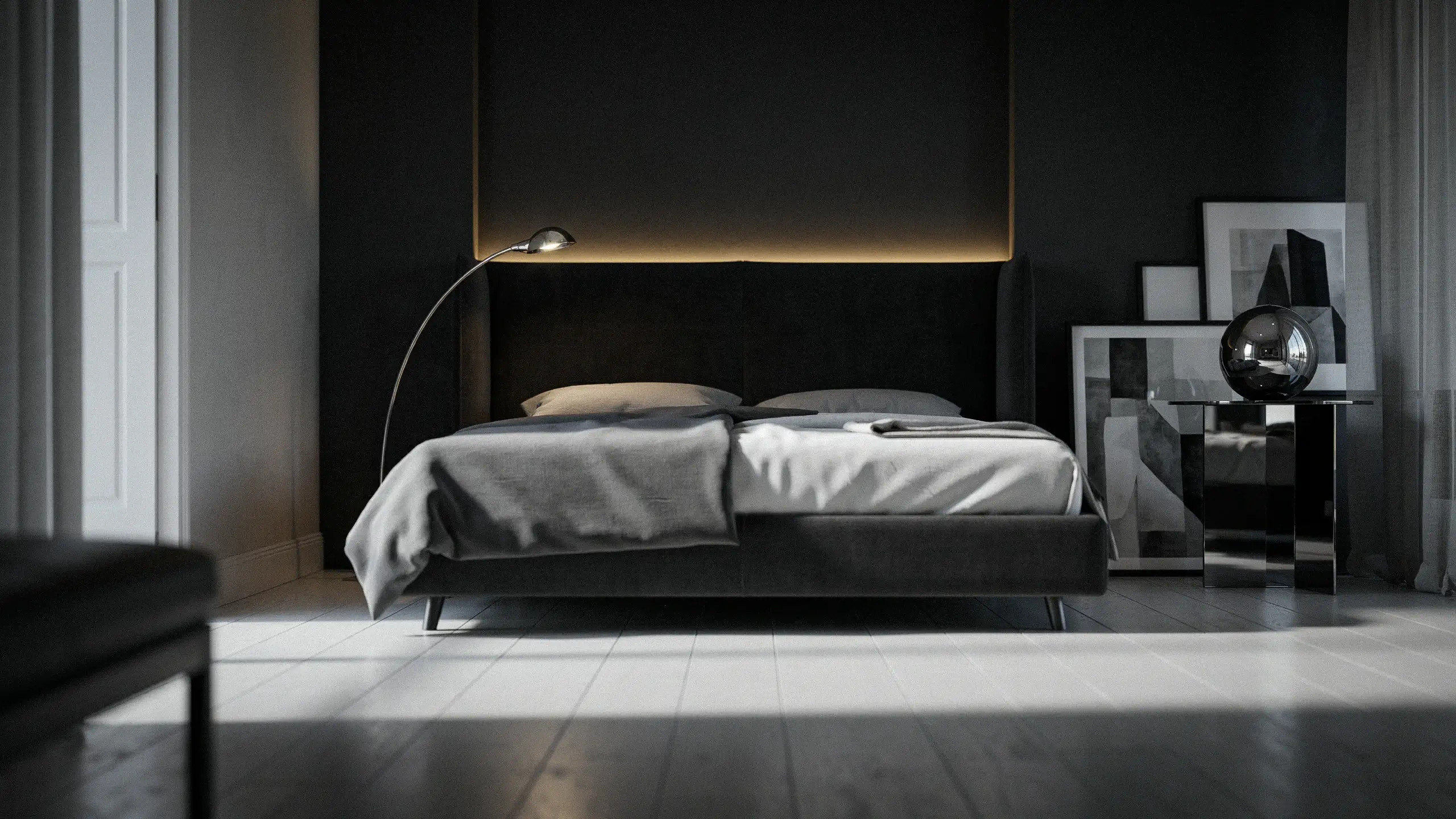 Modern dark monochrome bedroom with a curved arc floor lamp, metallic globe sculpture, and streaks of natural sunlight across the white flooring.v